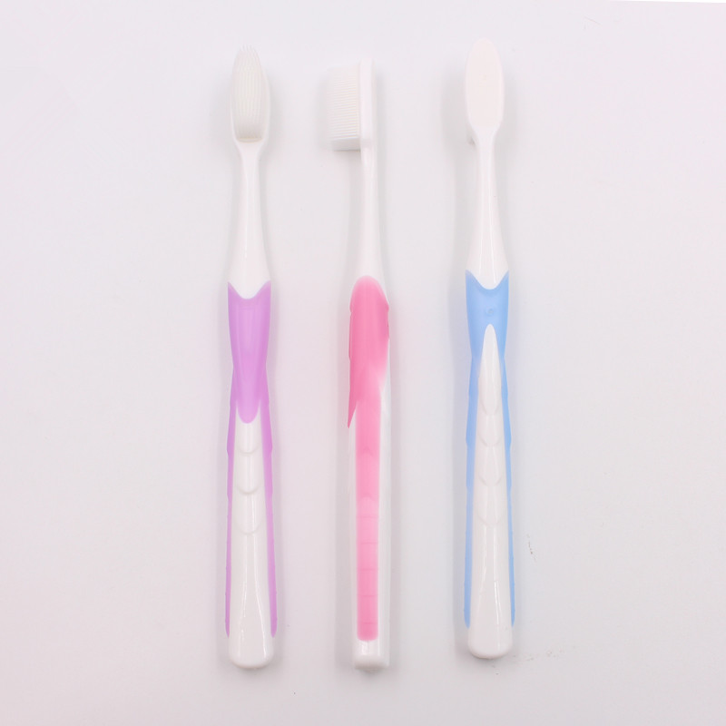 Cepillo de dientes adulto de cerdas blancas de nanómetro